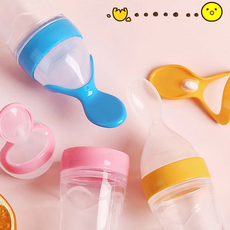 Silicone Baby Squeeze Feeding Bottle with Spoon – Newborn Training Rice Cereal & Food Supplement Feeder