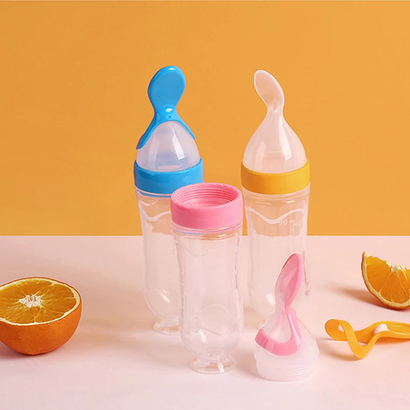 Silicone Baby Squeeze Feeding Bottle with Spoon – Newborn Training Rice Cereal & Food Supplement Feeder